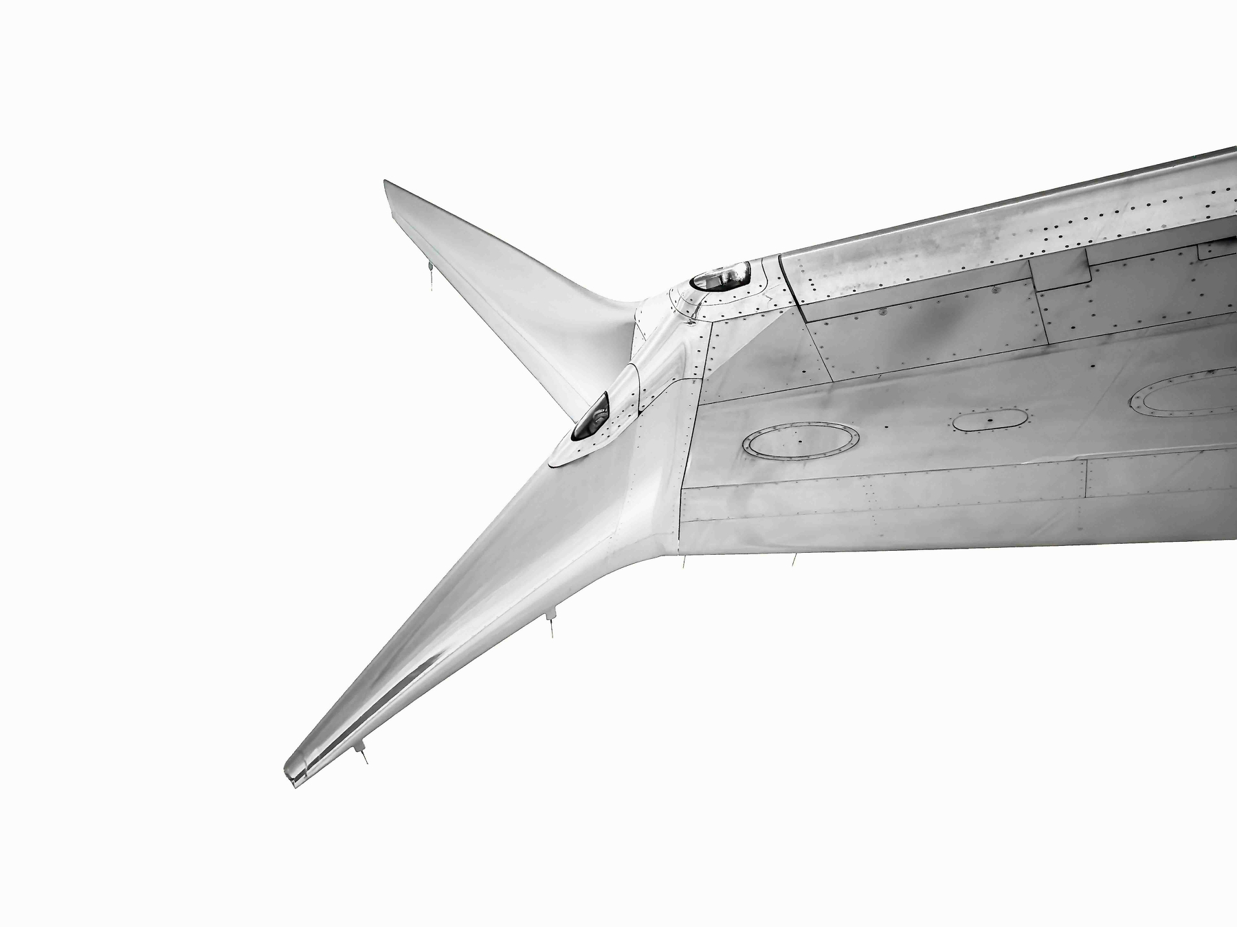 Auto-generated description: A close-up view of the tail section of an aircraft, highlighting its sleek, aerodynamic design.